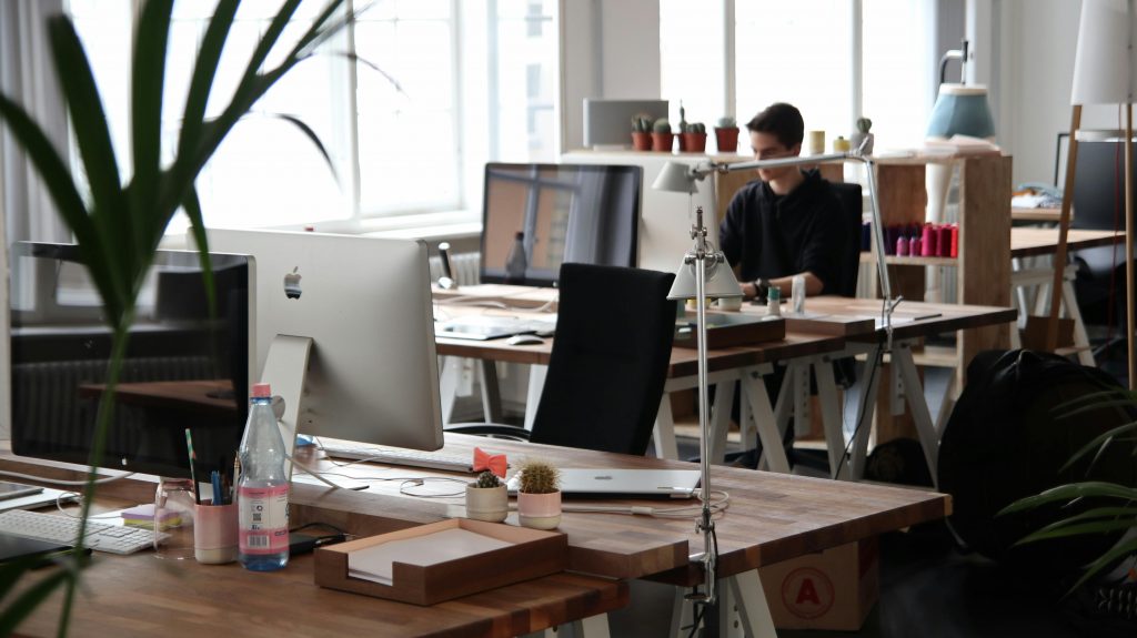 pexels-photo-380769-380769 Open-plan office with modern decor and natural lighting, ideal for productivity.